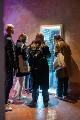 People interacting with a light artwork by artist Jacqueline Hen. Photo Gavriil Papadiotis 
