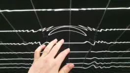 immersive light art installation that is an infinity illusion out of white and black grid. artwork by artist Jacqueline hen 